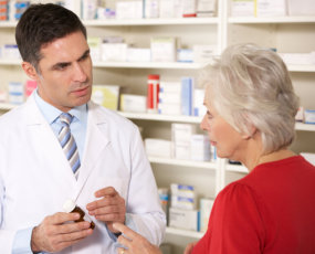 senior woman and a pharmacist